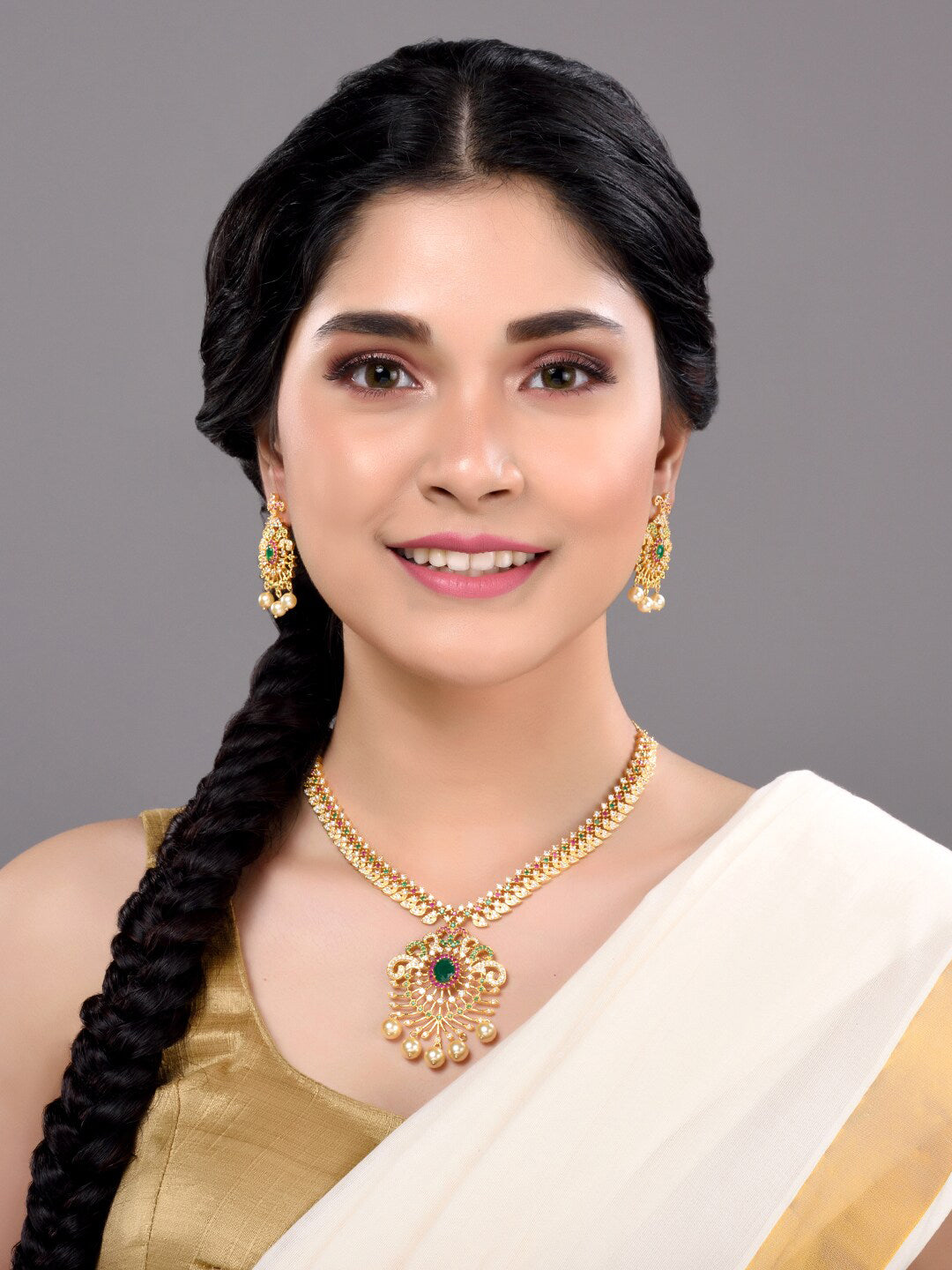 Saraf RS Jewellery Women Gold-Toned & Multi-Coloured CZ-Studded Handcrafted Jewellery Set - Swadesiicart