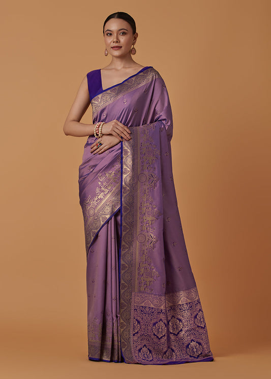 Monjolika Fashion Lavender Banarasi Silk Blend SareeWith Traditional & Modern Dulha Dulhan Figure Zari Woven Detailing | Swadesiicart
