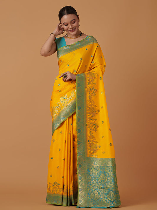 Monjolika Fashion Yellow Banarasi Silk Blend SareeWith Traditional & Modern Dulha Dulhan Figure Zari Woven Detailing | Swadesiicart