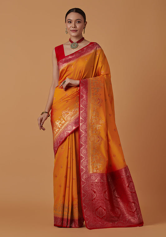 Monjolika Fashion Amber Banarasi Silk Blend SareeWith Traditional & Modern Dulha Dulhan Figure Zari Woven Detailing | Swadesiicart