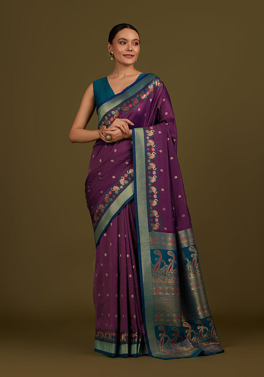 Monjolika Fashion Dark Purple Banarasi Silk Blend SareeIn Classic Paisley & Rich Zari Pallu Comes With Unstitched Blouse | Swadesiicart