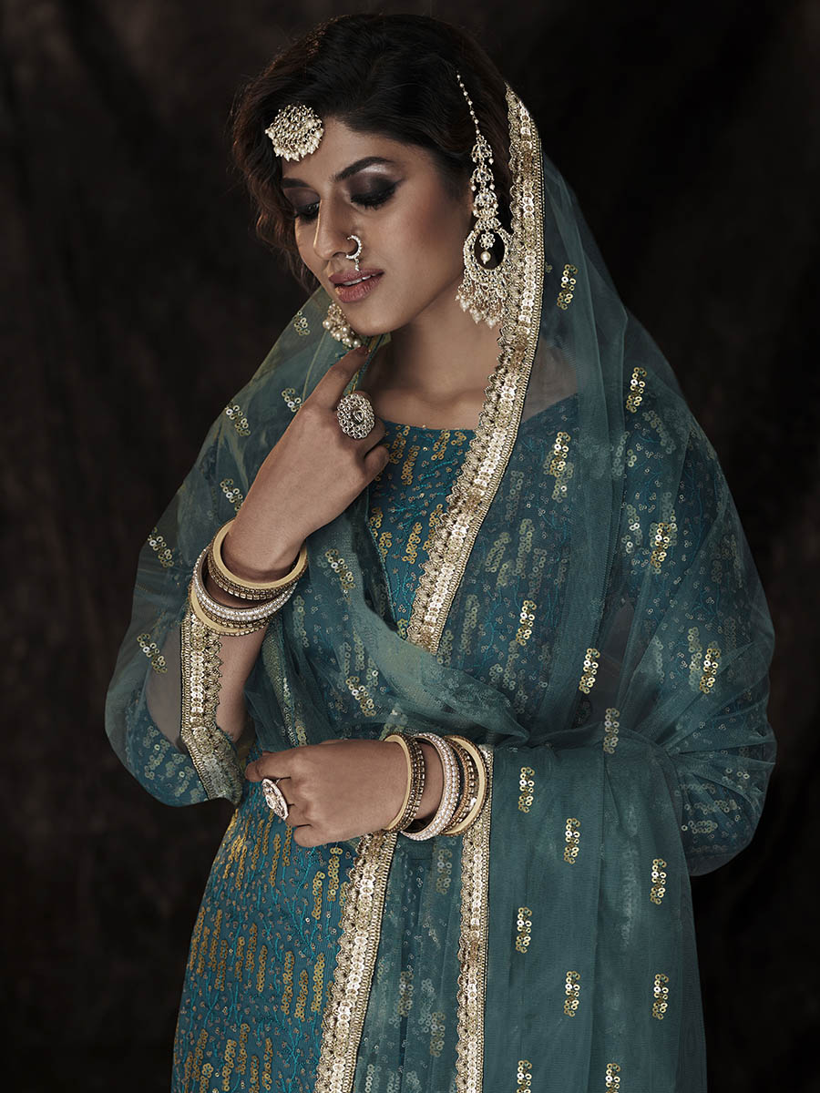 Myra Dark Firozi Net Embroidered Sharara Suit | Swadesiicart