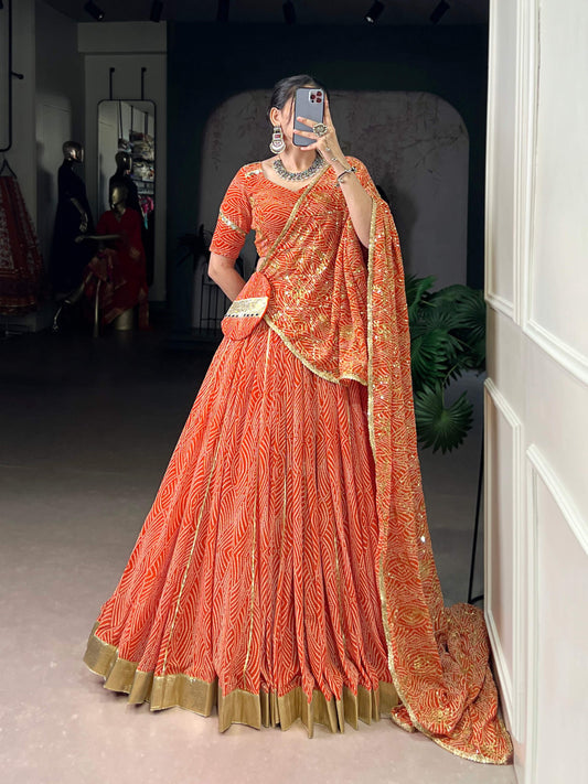 Lorenvalley Fashion Orange Georgette Bandhej Print and Embossed Design Lace with Gota Patti Touch Up Lehenga Choli with Dupatta - Swadesiicart