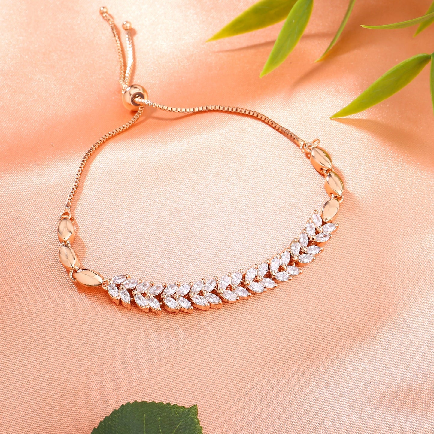Estele Rose Gold-Polished CZ Leaf Designer Adjustable Charm Bracelet with White American Diamonds for Women - Swadesiicart