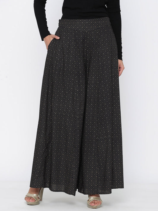 Juniper Women Black Rayon Printed Flared Palazzo | Swadesiicart