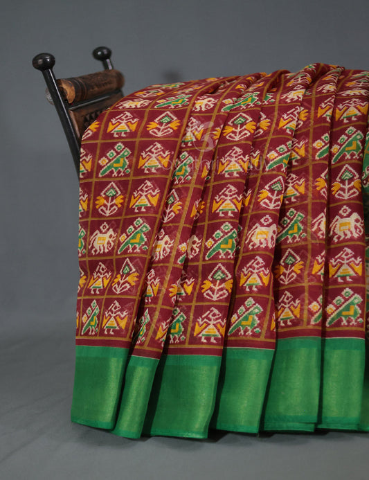 Shades of Maroon And Parrot Green Blouse Patola Print Semi Chanderi Saree By Gayathri Reddy Designer Studio | Swadesiicart