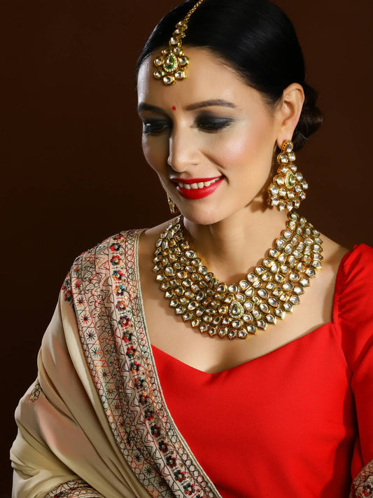 Gold-Polished Maharani Kundan Neckpiece With Earrings And Maang Tikka - Ruby Raang - Ruby Raang Studio