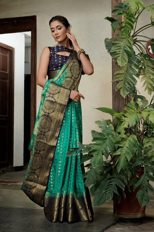 Vardha Teal Green Golden Zari Banarasi Raw Silk Saree | Swadesiicart