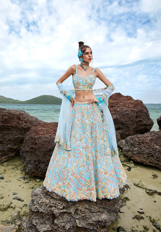 House of Panchhi Turquoise Blue Net Multi Colour Sequins, Zarkans And Thread Embroidery Lehenga Choli & Dupatta