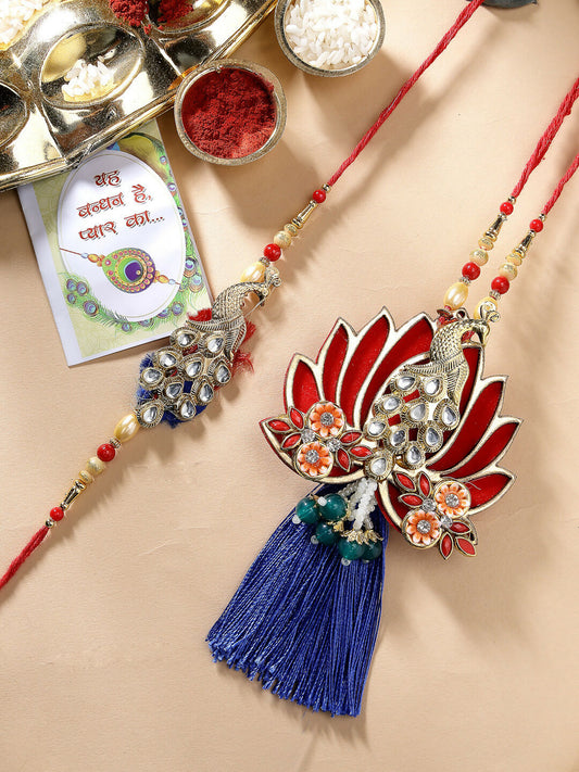 NVR Women & Men Set of 2 Gold-Toned Peacock Design Stone-Studded Bhaiya Bhabhi Rakhi With Roli Chawal & Chocolate | Swadesiicart