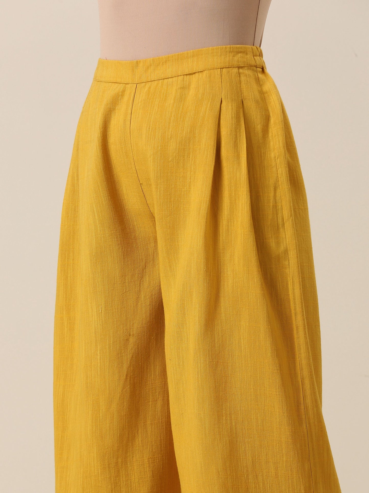 trueBrowns Mustard Yellow Slub Texture Sleevesless Jacket Pant Set | Swadesiicart