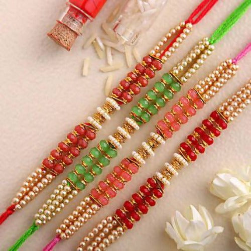 Set of 4 Pretty Pearls Rakhi and Kaju Katli Box | Swadesiicart