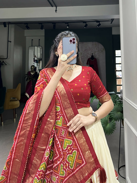 Lorenvalley Offwhite and Red Tussar Silk Patola Print Lehenga Choli | Swadesiicart