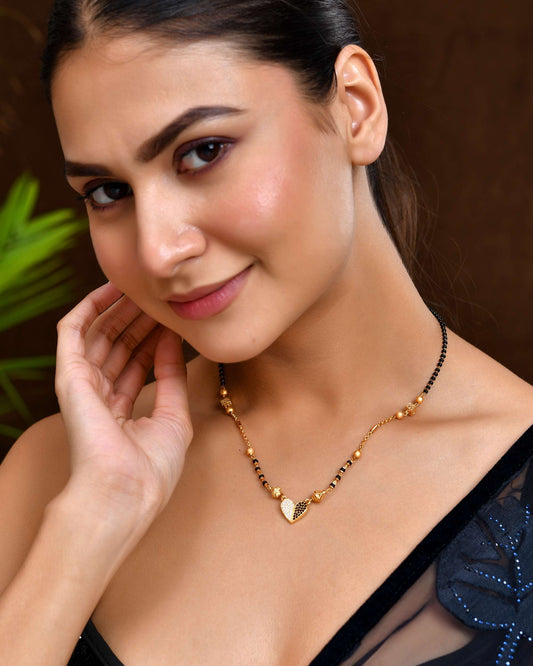 Jewels Nest Dual-Toned Artificial Stone Heart Mangalsutra with Golden Beads