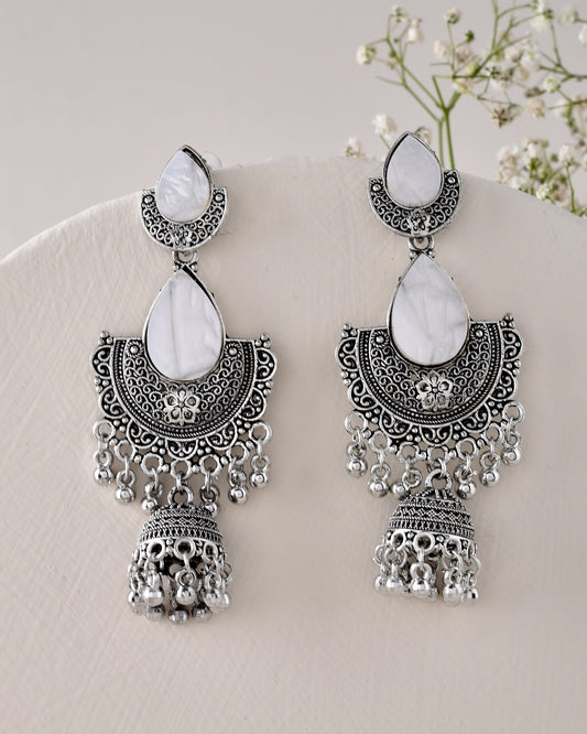 Jewels Nest Oxidized Silver Half Moon Jhumka Earrings with Intricate Design