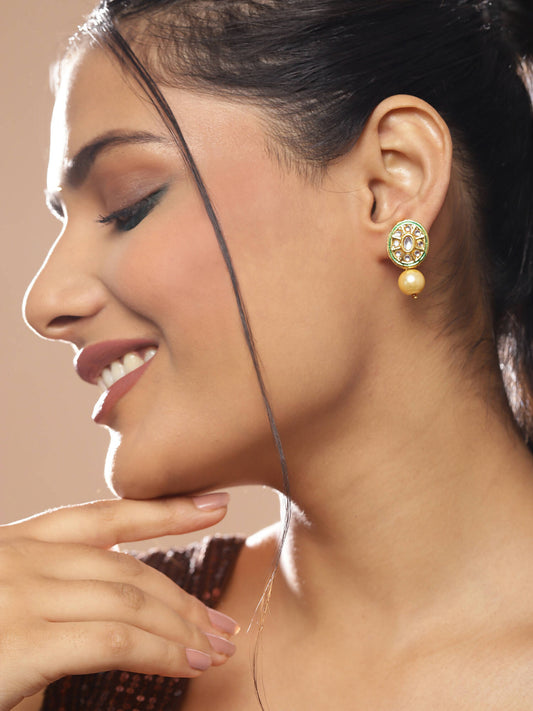 Gold-Toned White Kundan Oval-Shape Gold-Polished Studs Earrings - Ruby Raang | Swadesiicart
