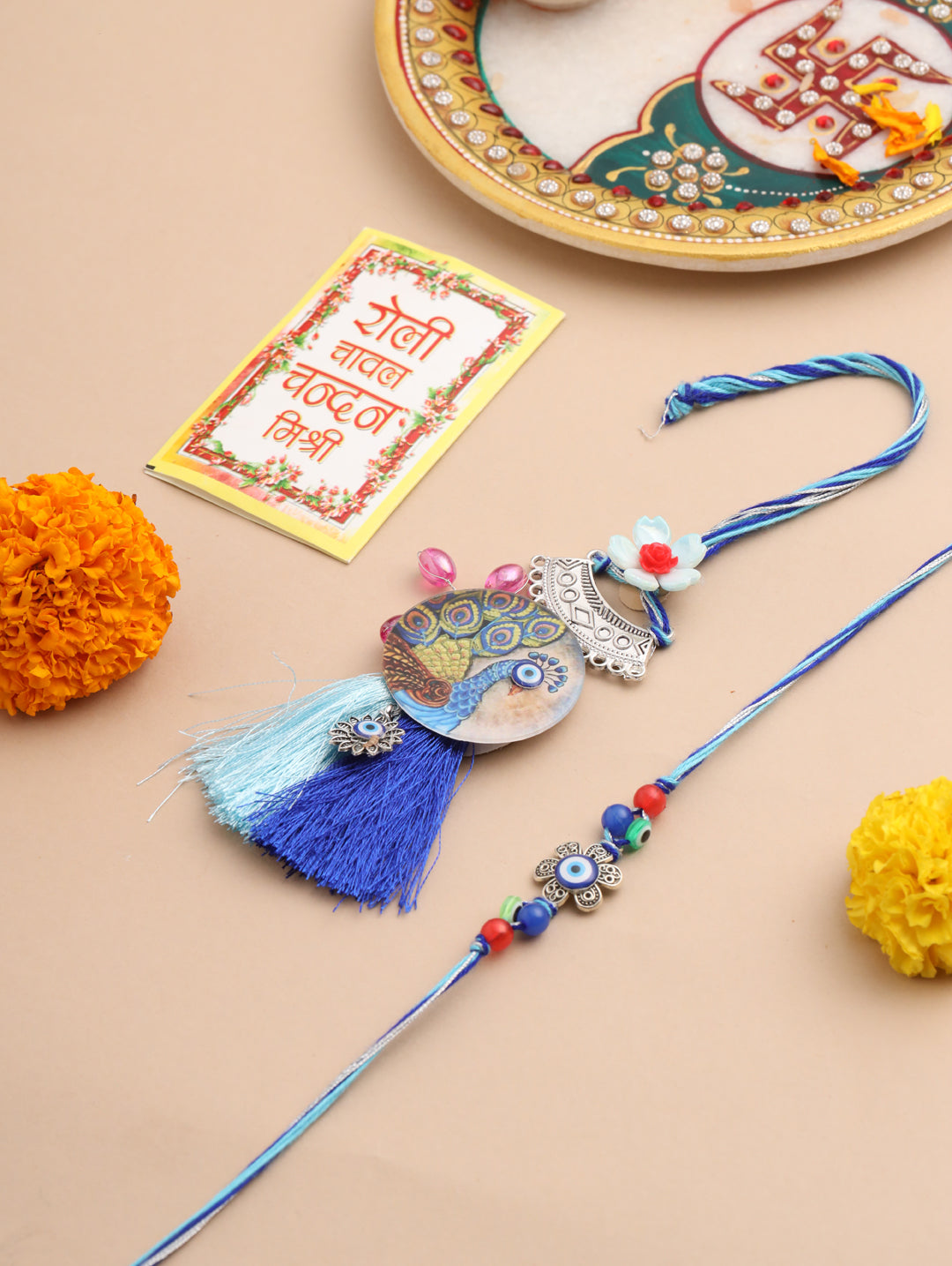 NVR Set of 2 Blue Evil Eye & Peacock Design Artificial Beads Bhaiya Bhabhi Rakhi With Roli Chawal Chandan & Mishri | Swadesiicart
