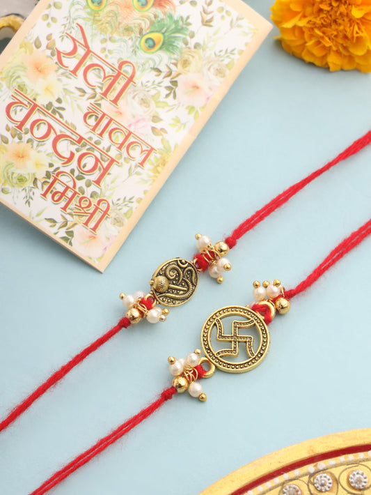 NVR Men Set of 2 Gold Toned Pearls Swastik Desgin Thread Rakhi with Roli Chawal Chandan & Mishri | Swadesiicart