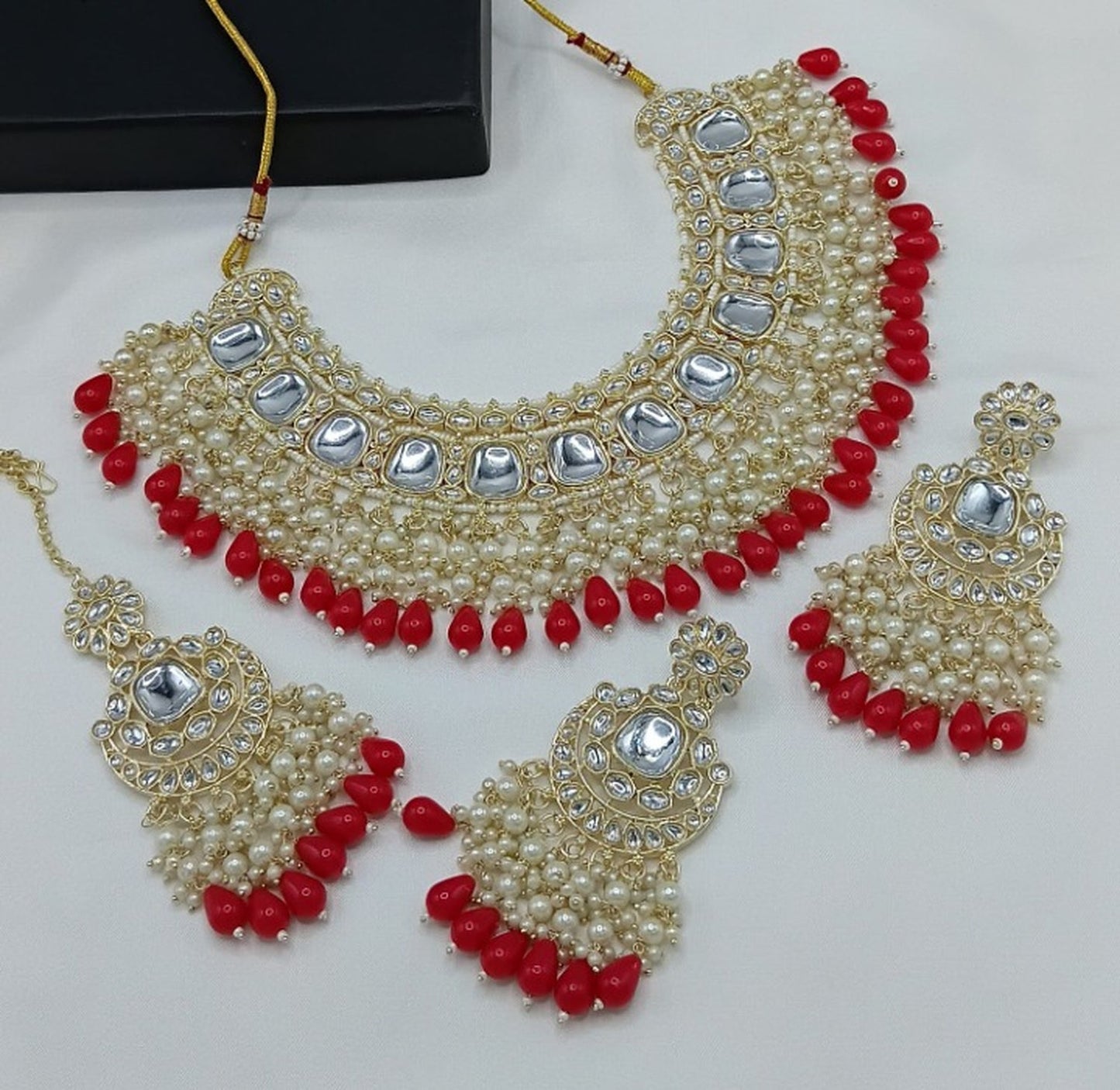Jewel City Luxurious Kundan Choker Set with Pearl and Red Bead Accents - Traditional Indian Bridal Jewelry | Swadesiicart