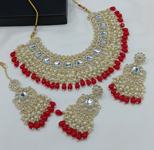 Jewel City Luxurious Kundan Choker Set with Pearl and Red Bead Accents - Traditional Indian Bridal Jewelry | Swadesiicart