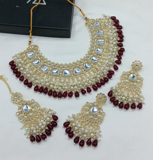 Jewel City Luxurious Kundan Choker Set with Pearl and Maroon Bead Accents - Traditional Indian Bridal Jewelry | Swadesiicart