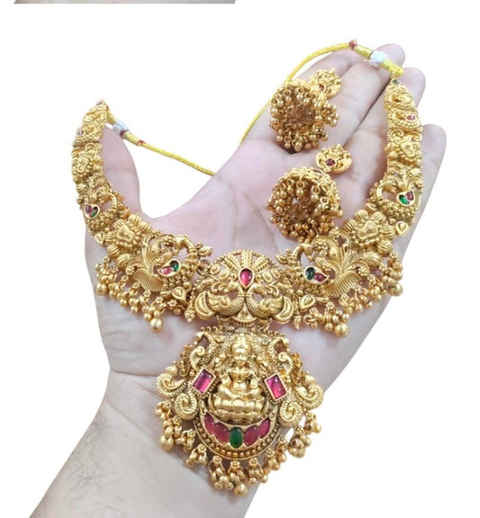 Jewel City Gold Lakshmi Temple Necklace Set - Bridal Jewelry with Ruby and Emerald Accents | Swadesiicart