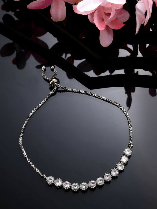 NVR Women Silver-Plated American Diamond Studded Rakhi With Roli Chawal | Swadesiicart