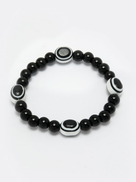 NVR Women & Men Black Evil Eye Elasticated Rakhi With Roli Chawal - Swadesiicart