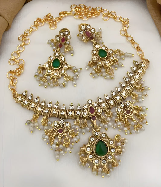 Jewel City Elegant Kundan Choker Set - Gold-Plated Pearl Drop Necklace with Green & Ruby Stones and Matching Earrings | Swadesiicart
