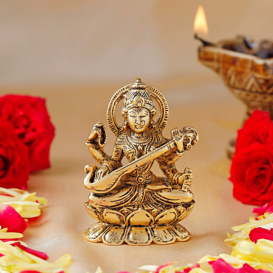 Estele Gold-Polished Goddess of Knowledge Sarasavti Ma Idol for Home & Car decor - Swadesiicart