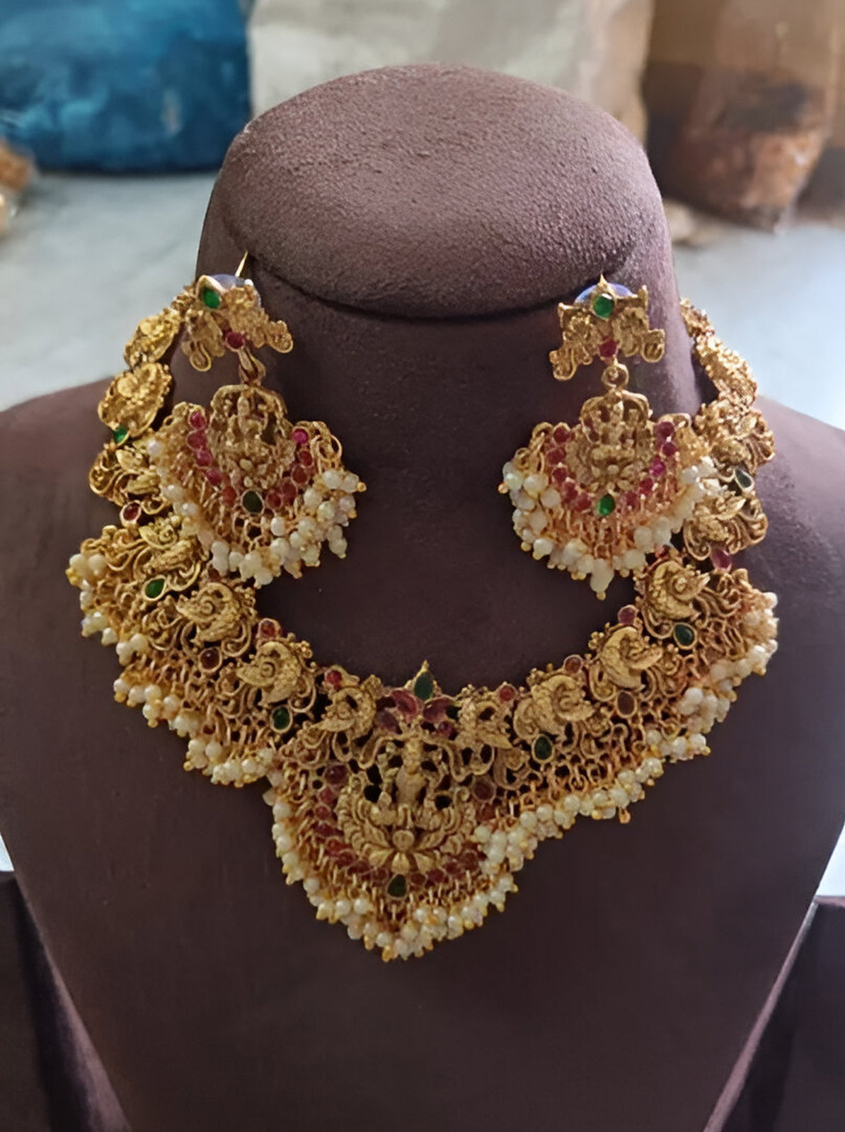 Jewel City Traditional Lakshmi Temple Necklace Set – Gold-Plated Bridal Jewelry with Pearls & Kemp Stones | Swadesiicart