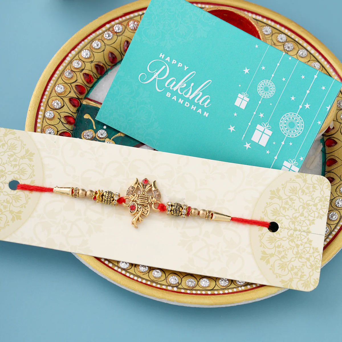 trueBrowns X Voylla Designer Ganesha Rakhi With Roli Chaawal Pack | Swadesiicart