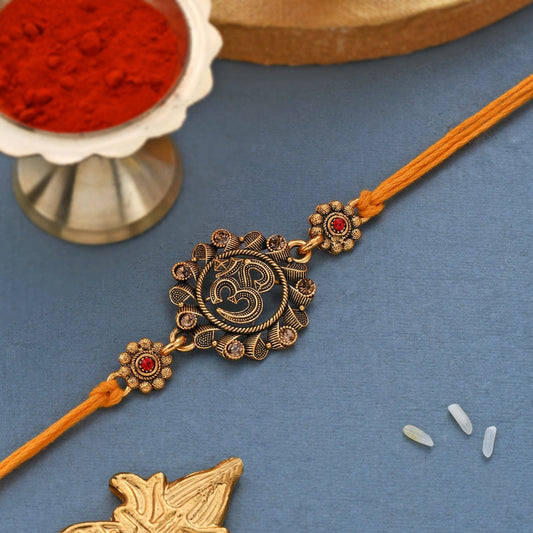 trueBrowns X Voylla Deity Inspired 'OM' Rakhi With Red Thread | Swadesiicart
