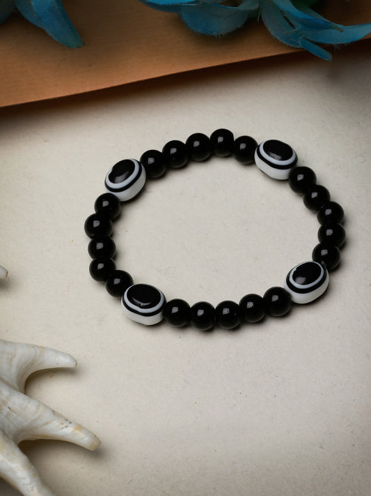 NVR Women & Men Black Evil Eye Elasticated Rakhi With Roli Chawal - NR Retail-NVR