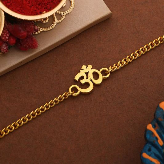 trueBrowns Auspicious Gold Tone Brass Om Bracelet Style Rakhi | Swadesiicart