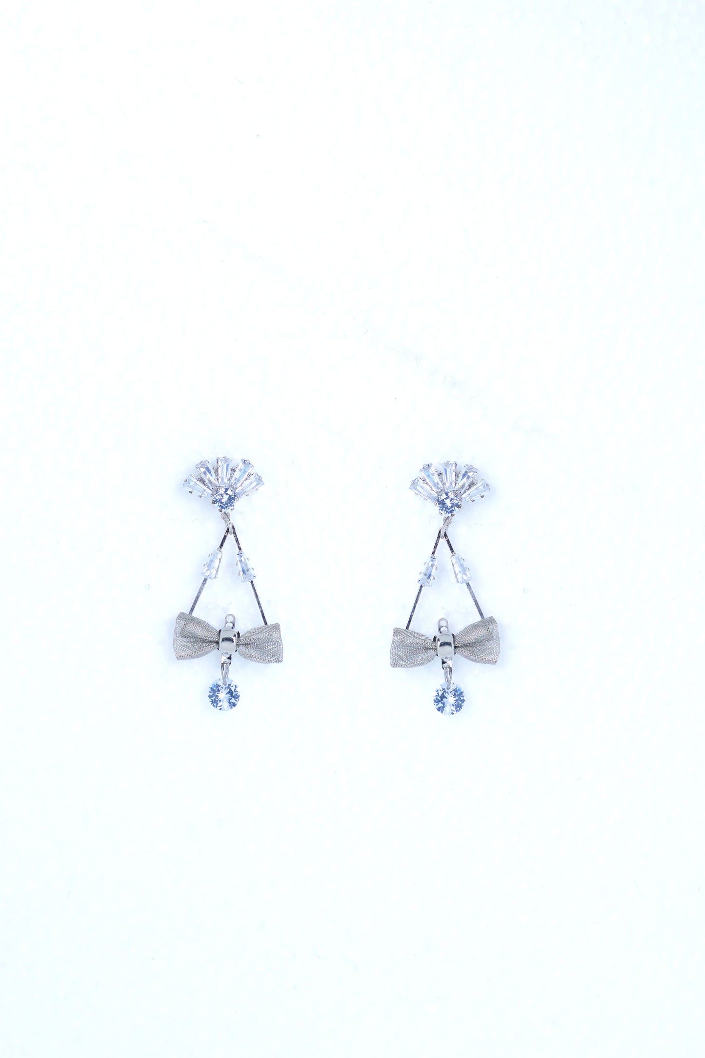 VOJ Silver Plated Stone Studded With Bow Triangle Shaped Earrings - Swadesiicart