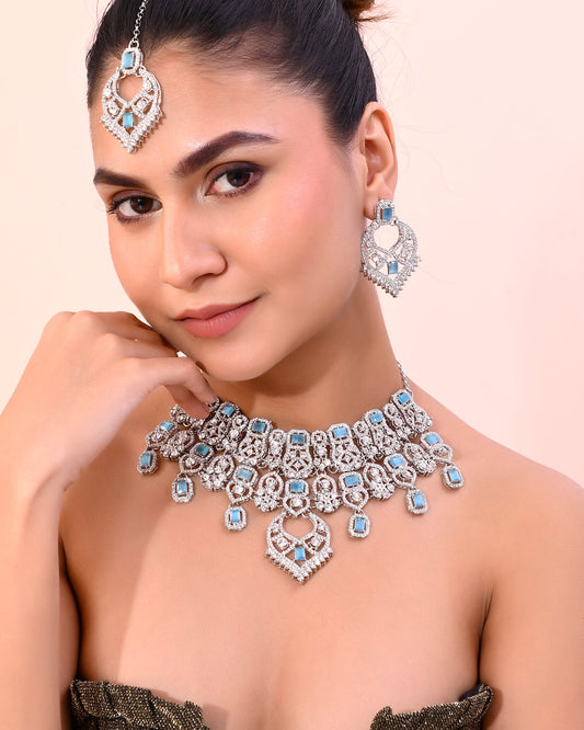 VOJ Silver Plated Designer AD Studded Necklace With Earrings And Mangtikka - Swadesiicart