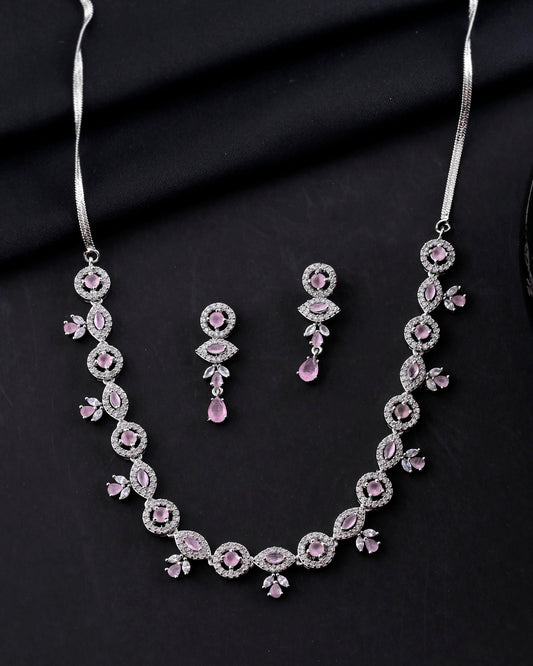 VOJ Silver Toned White And Baby Pink Stone Studded AD Jewellery Set