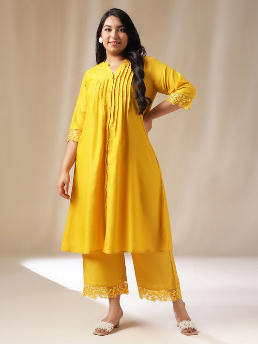 Janasya Pleated Muslin Yellow Solid Band Collar Kurta Set | Swadesiicart