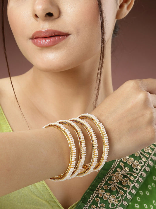 NVR Women's Set of 4 Gold-Polished Pearl Handcrafted Traditional Bangles - Swadesiicart
