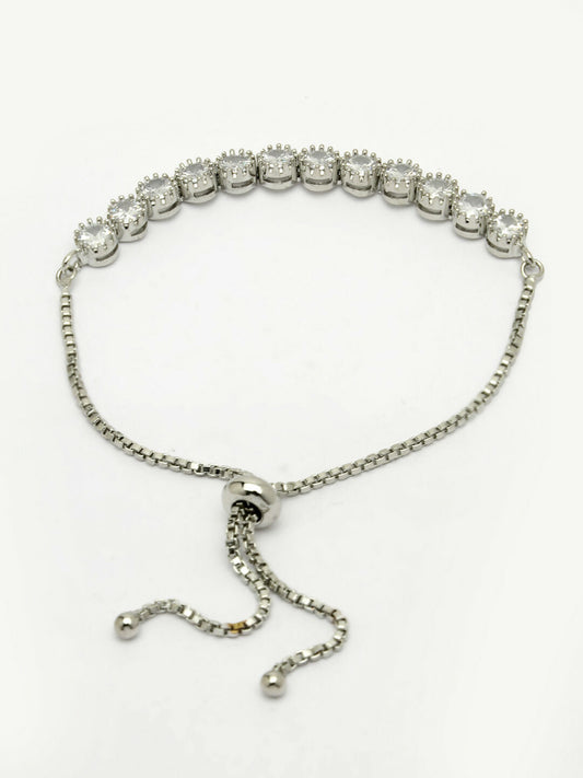 NVR Women Silver-Plated American Diamond Studded Rakhi With Roli Chawal | Swadesiicart