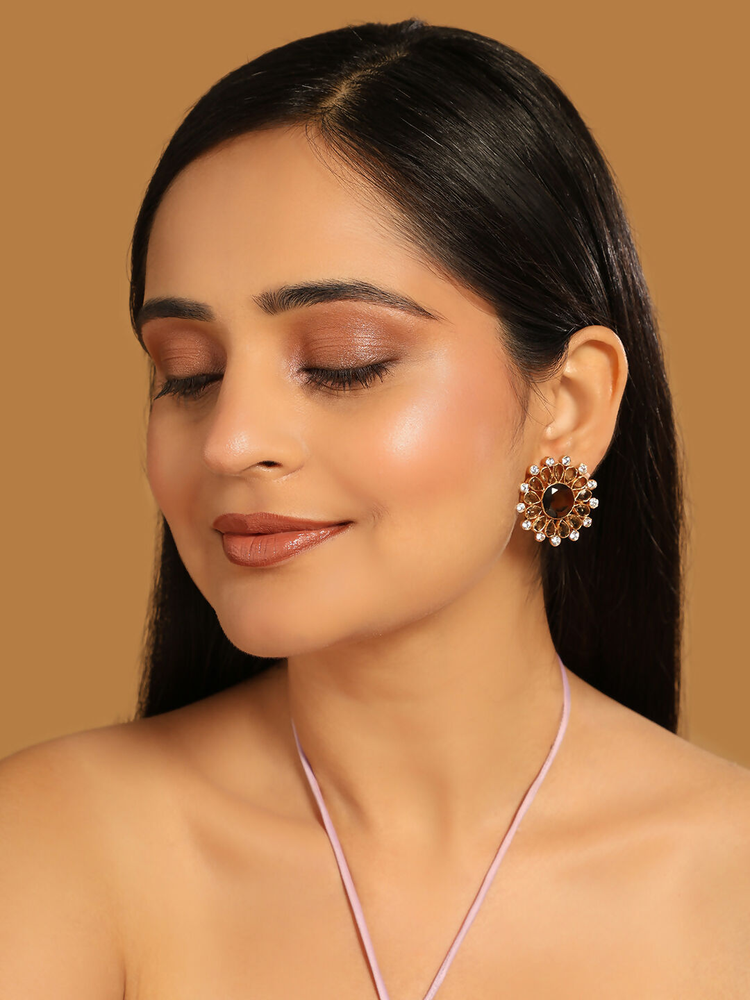 Nuyug 22K Gold Plated Faux Smoky Quartz & White Crystal Studded Contemporary Floral Shaped Studs | Swadesiicart