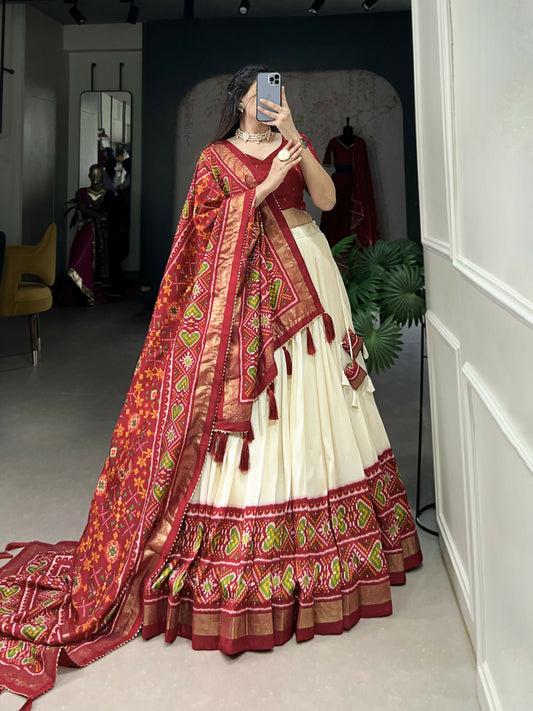 Lorenvalley Offwhite and Red Tussar Silk Patola Print Lehenga Choli | Swadesiicart