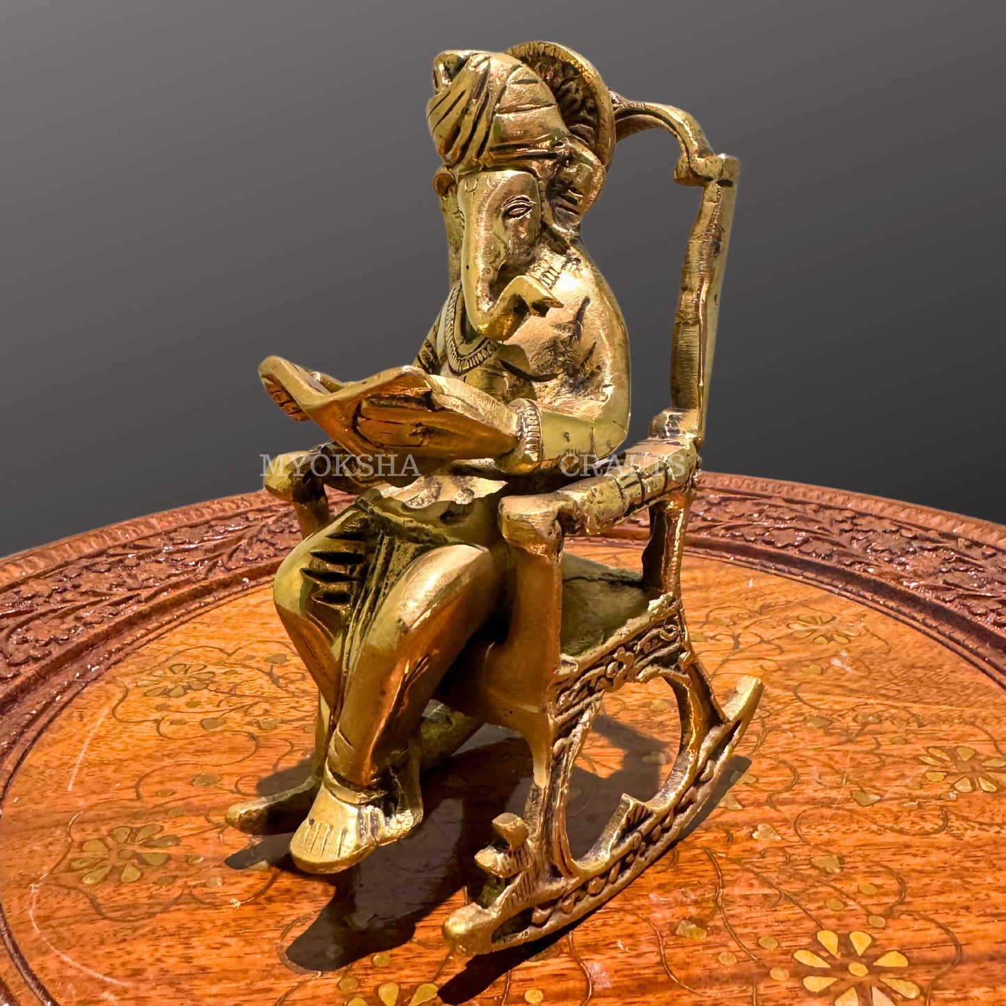 Brass Ganesha on Rocking Chair Reading Nooks | Swadesiicart
