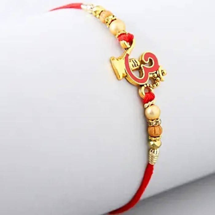 Auspicious Om Pearl Rakhi & Kaju Roll Box