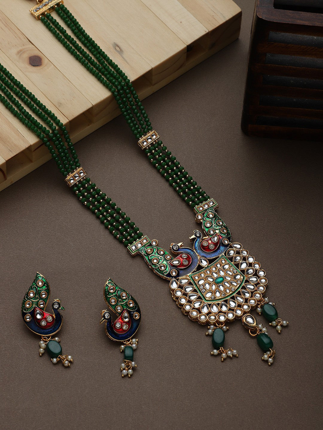 Cardinal Gold-Polished Green Studded Jewellery Set
