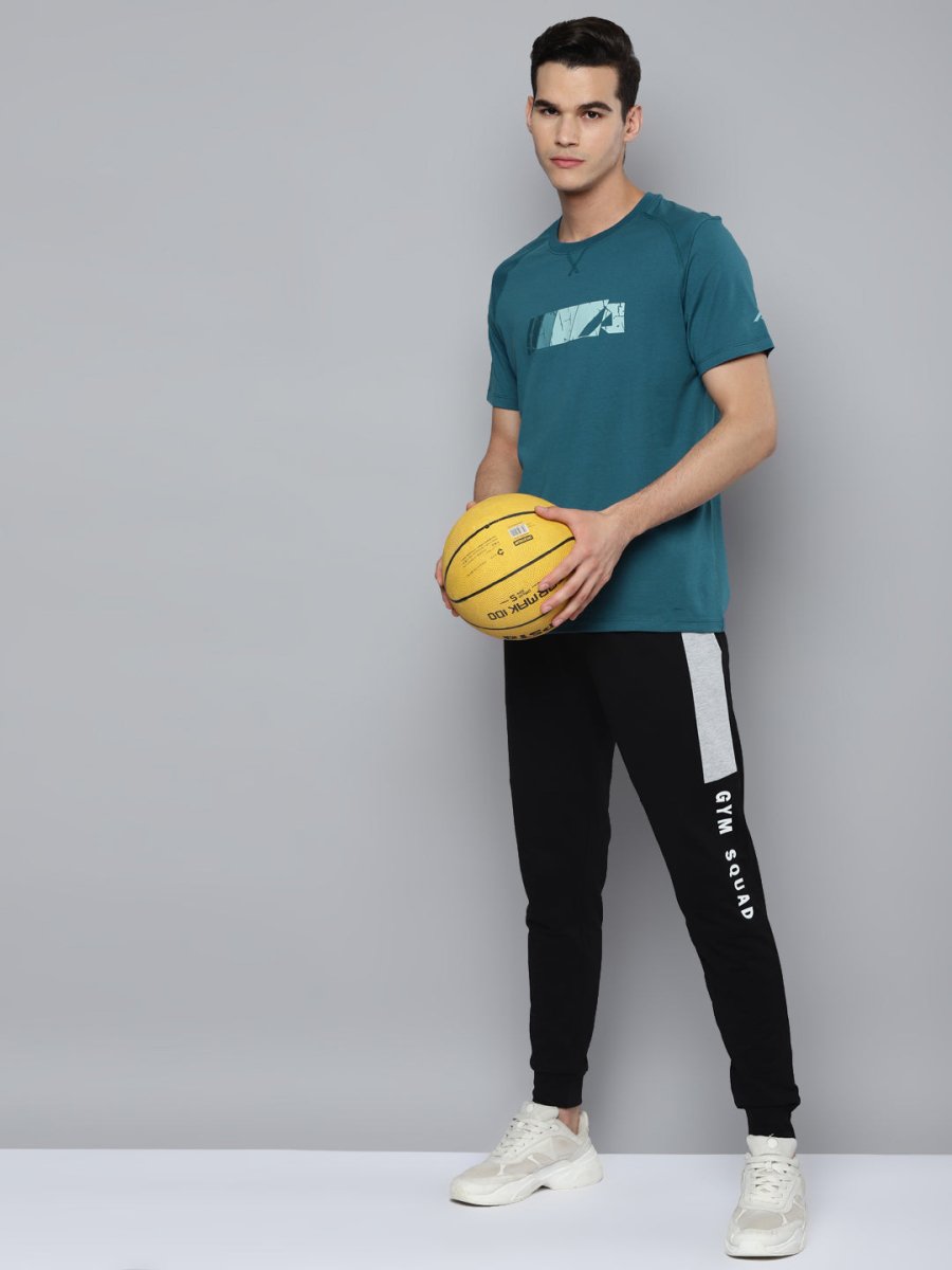 Alcis Men Teal Printed Slim Fit Running T-shirt | Swadesiicart