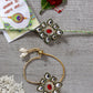 NVR Women & Men Set of 2 Gold Kundan-Studded Handcrafted Wraparound Rakhi Set With Roli Chawal | Swadesiicart