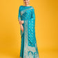 Monjolika Fashion Blushing Cyan Color Banarasi Satin Zari Woven Work Enhanced Elegance Silk Saree | Swadesiicart
