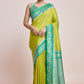 Monjolika Fashion Parrot Green Banarasi Silk In Satin Is Classy Embellished With Golden Zari Work Saree | Swadesiicart